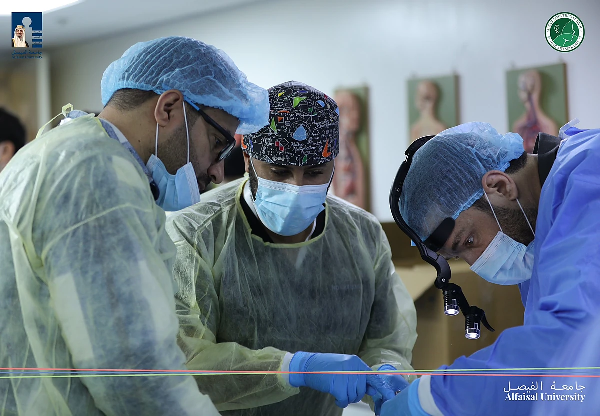Surgeons guiding a hands-on cadaver dissection